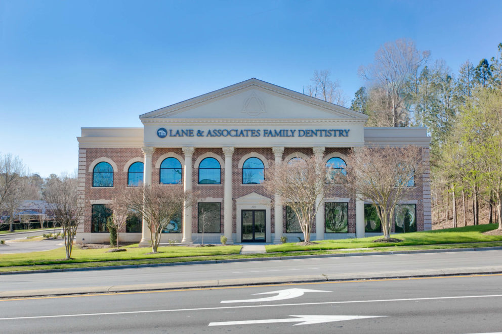 Exterior shot of Cary office showing whole building with columns