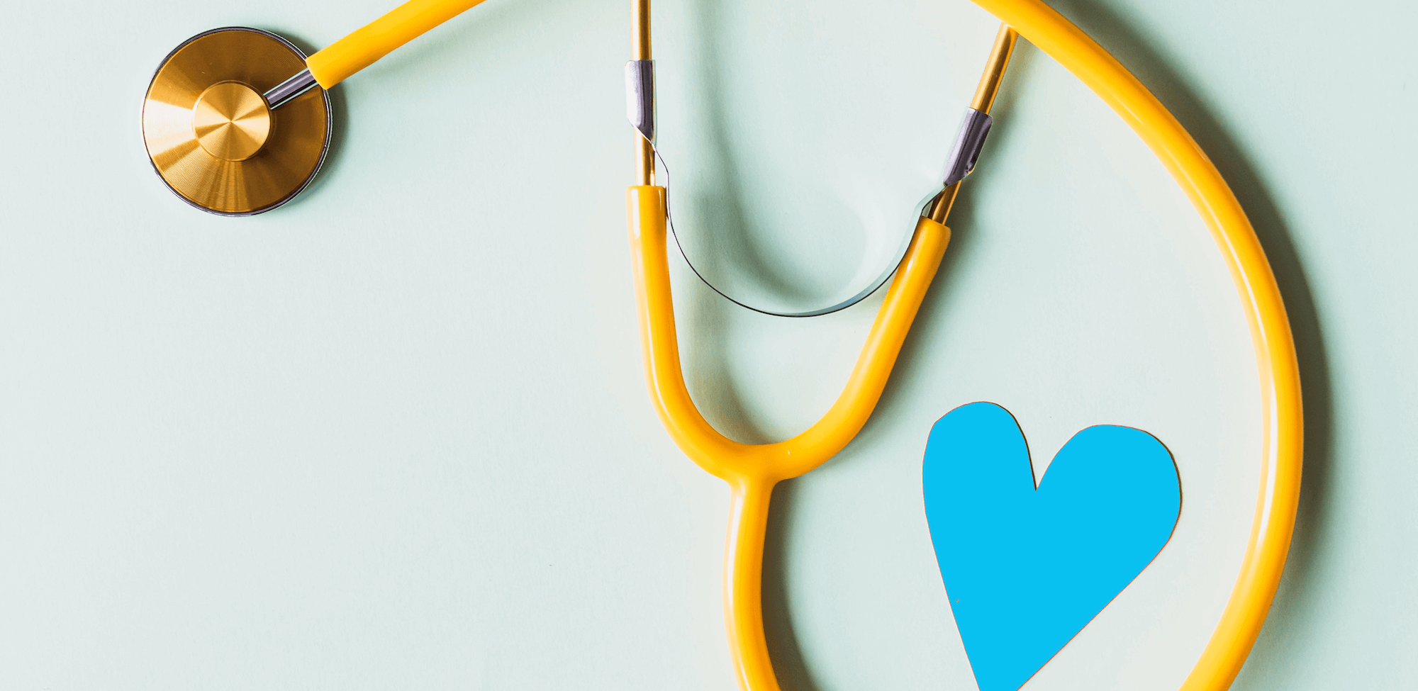 yellow stethoscope with blue heart shape